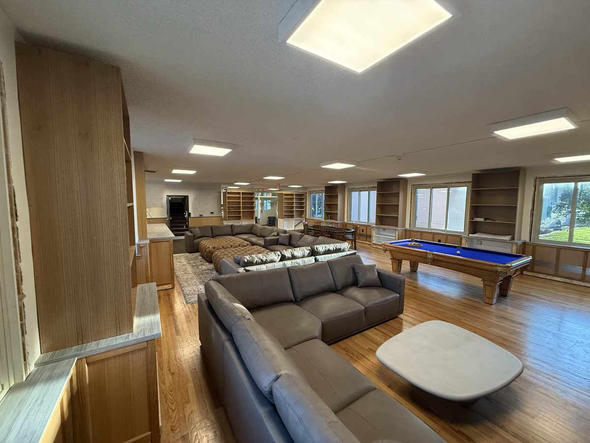 Great room seating area with sectional and pool table, August 21 2026