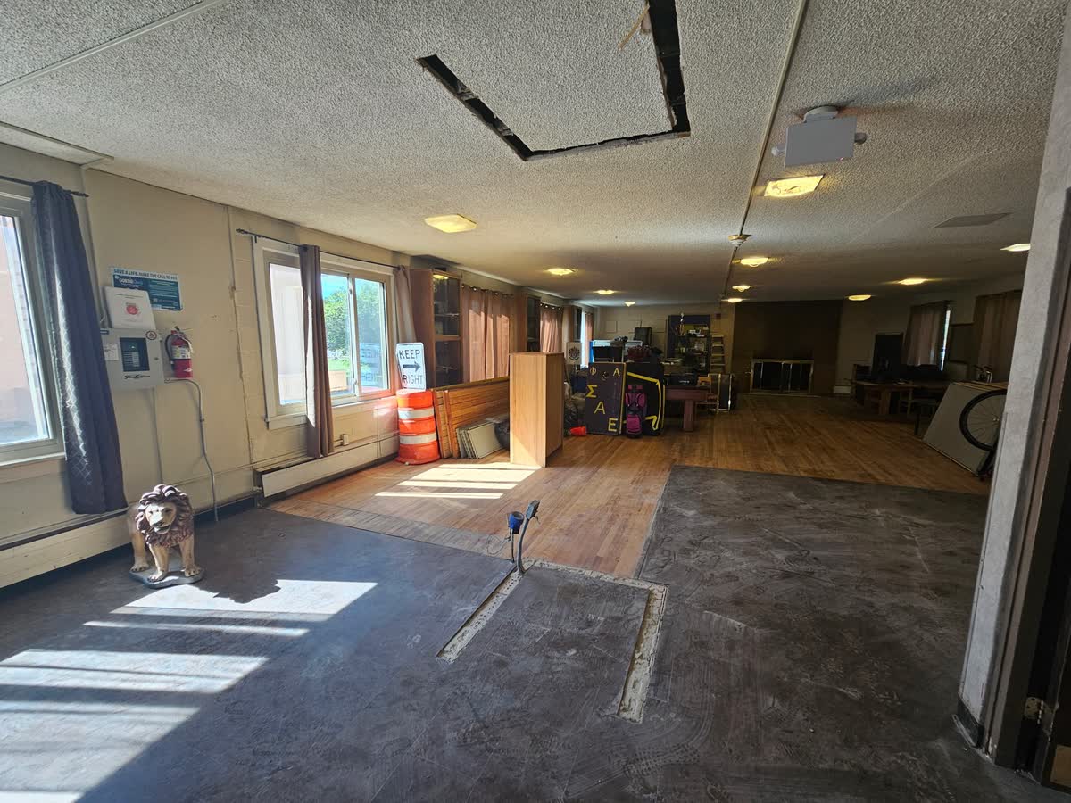 Wide view of main floor during active demolition phase