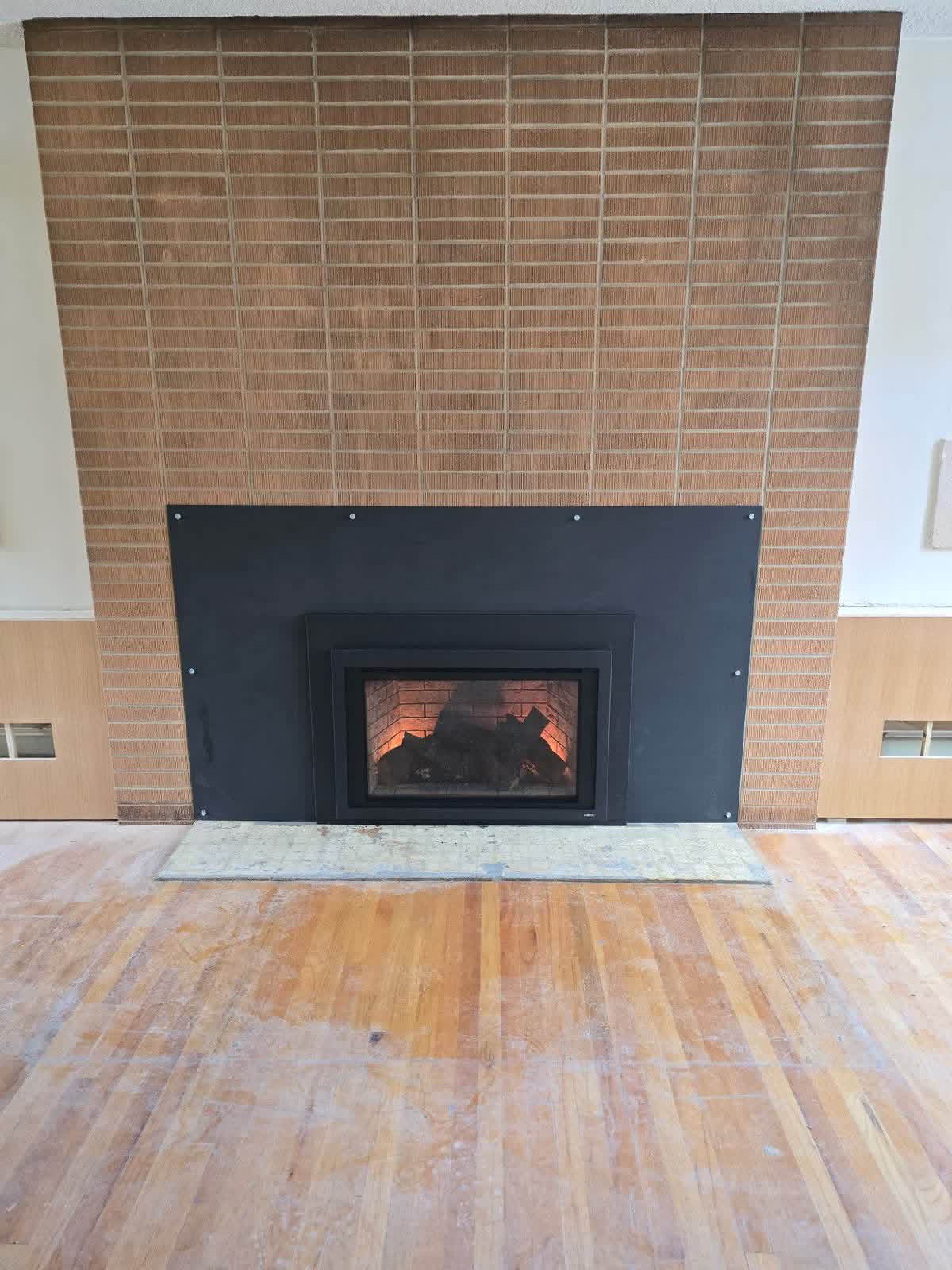 New fireplace insert installed in living room, July 20 2026